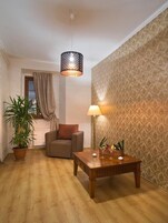 Honeymoon Suite, Fireplace | Living area | Flat-screen TV