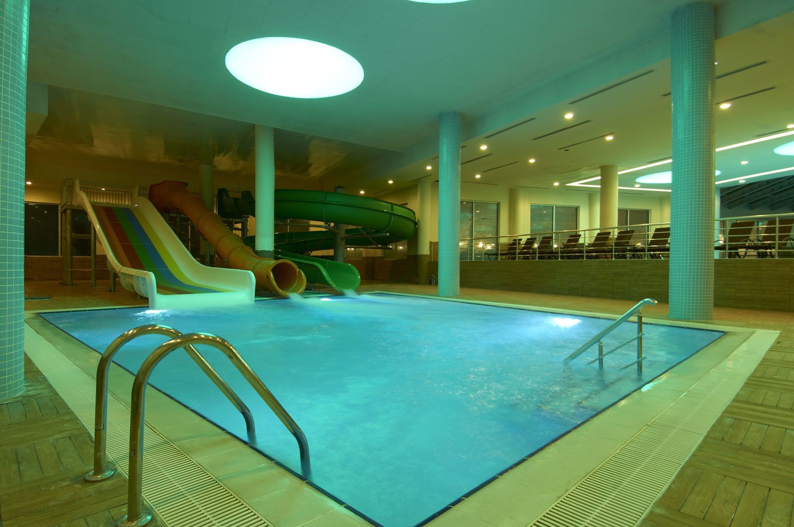 Indoor pool, outdoor pool, pool umbrellas, sun loungers