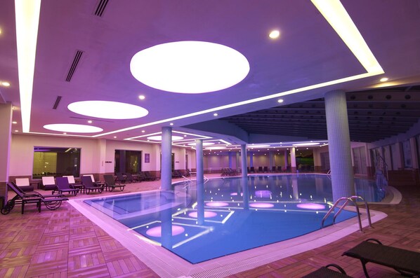 Indoor pool, outdoor pool, pool umbrellas, sun loungers