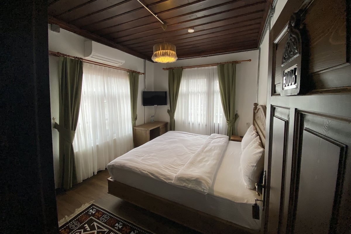 Deluxe Room, Balcony, River View | Hypo-allergenic bedding, memory foam beds, minibar, desk