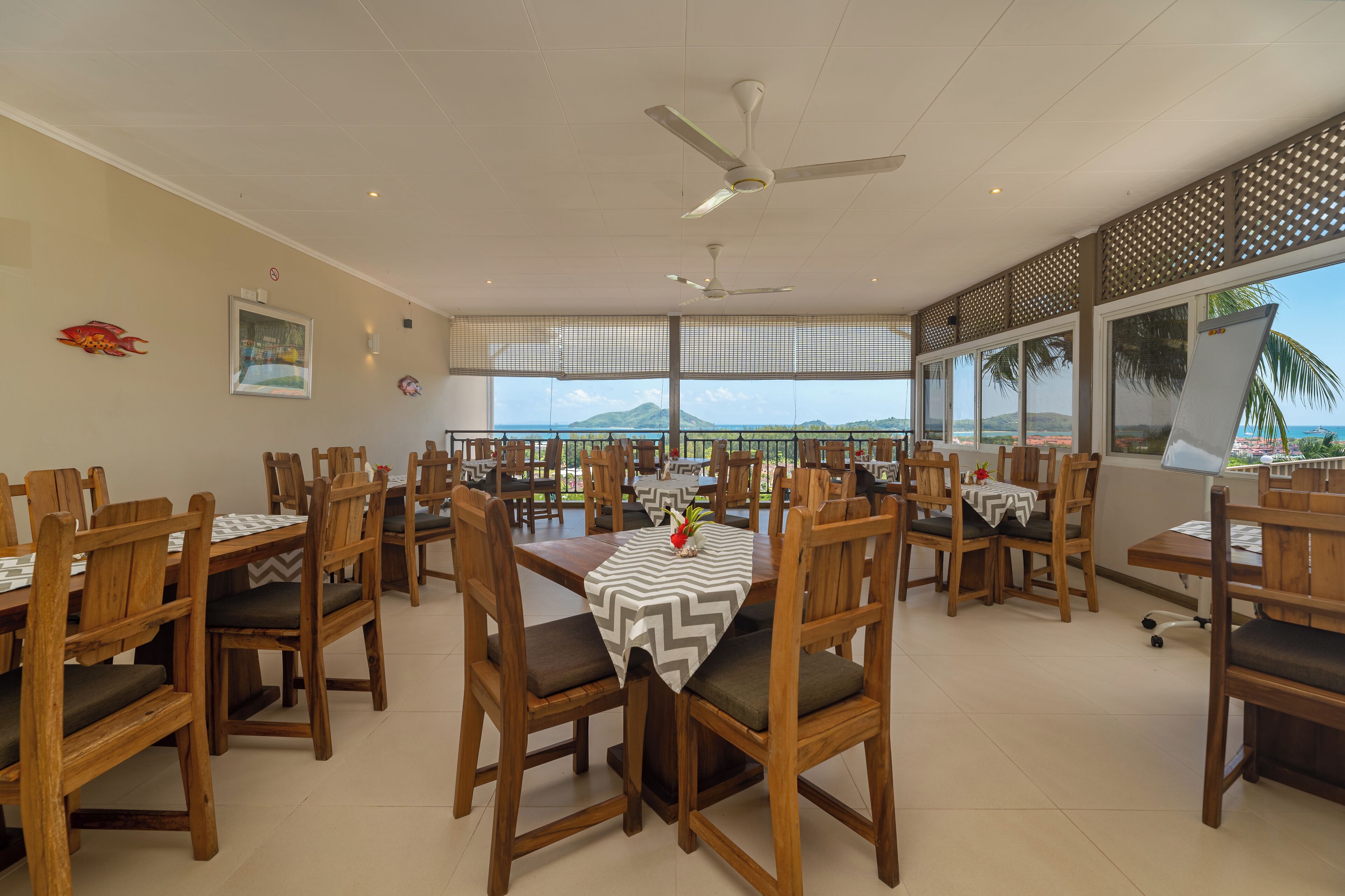 Breakfast, lunch, dinner served; local and international cuisine 