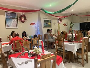 Breakfast, lunch, dinner served; local and international cuisine 