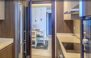 Apartment, 2 Bedrooms | Private kitchen | Full-size fridge, microwave, oven, stovetop