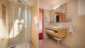 Shower, free toiletries, hair dryer, slippers
