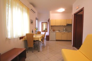 Standard Apartment, 1 Bedroom, Ground Floor | Living area | 43-inch flat-screen TV with satellite channels, TV