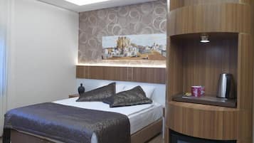 Kamar Double atau Twin | Minibar, brankas, meja kerja, dan tempat tidur bayi gratis