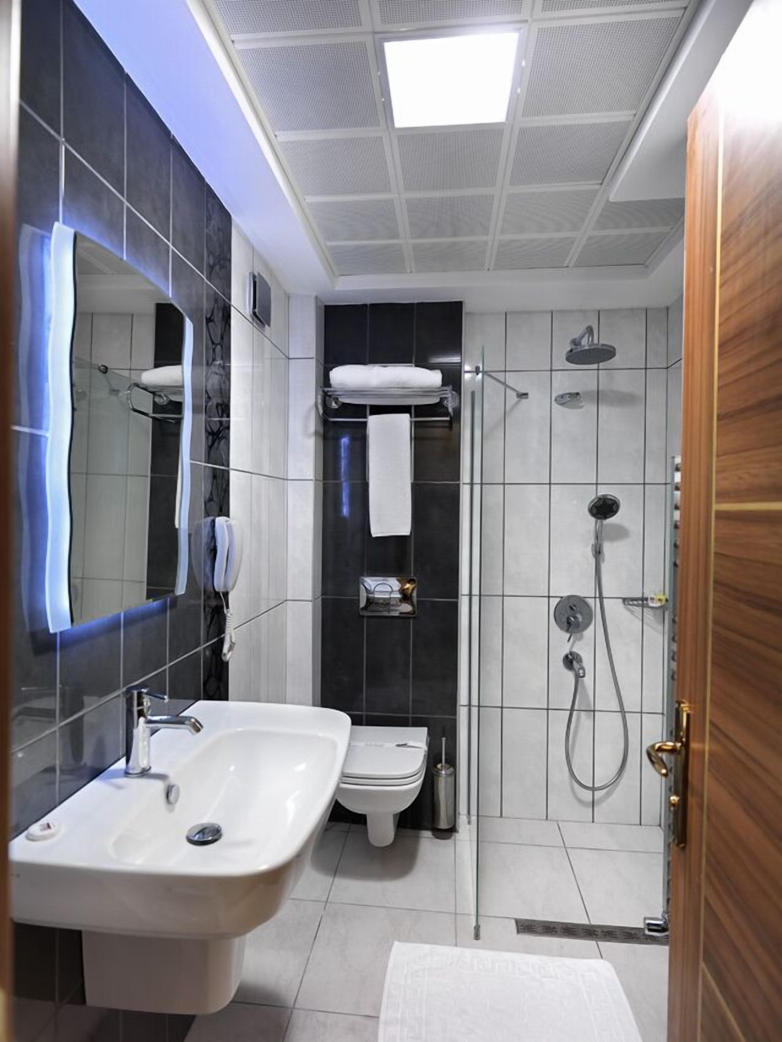 shower, free toiletries, hair dryer, slippers