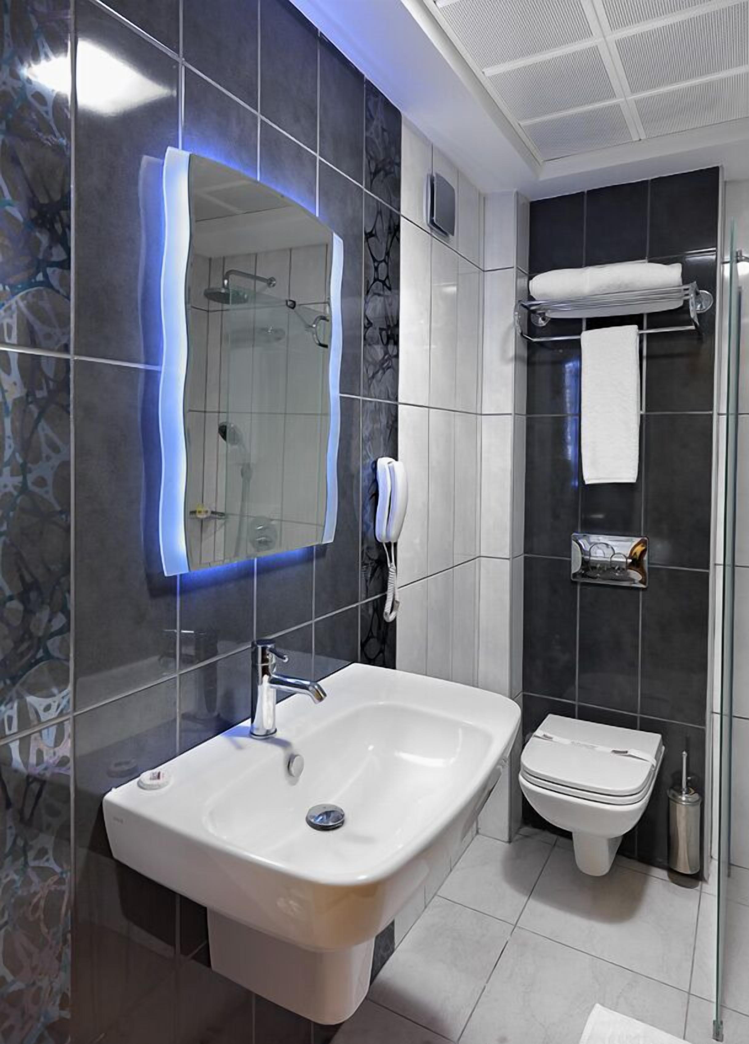 shower, free toiletries, hair dryer, slippers