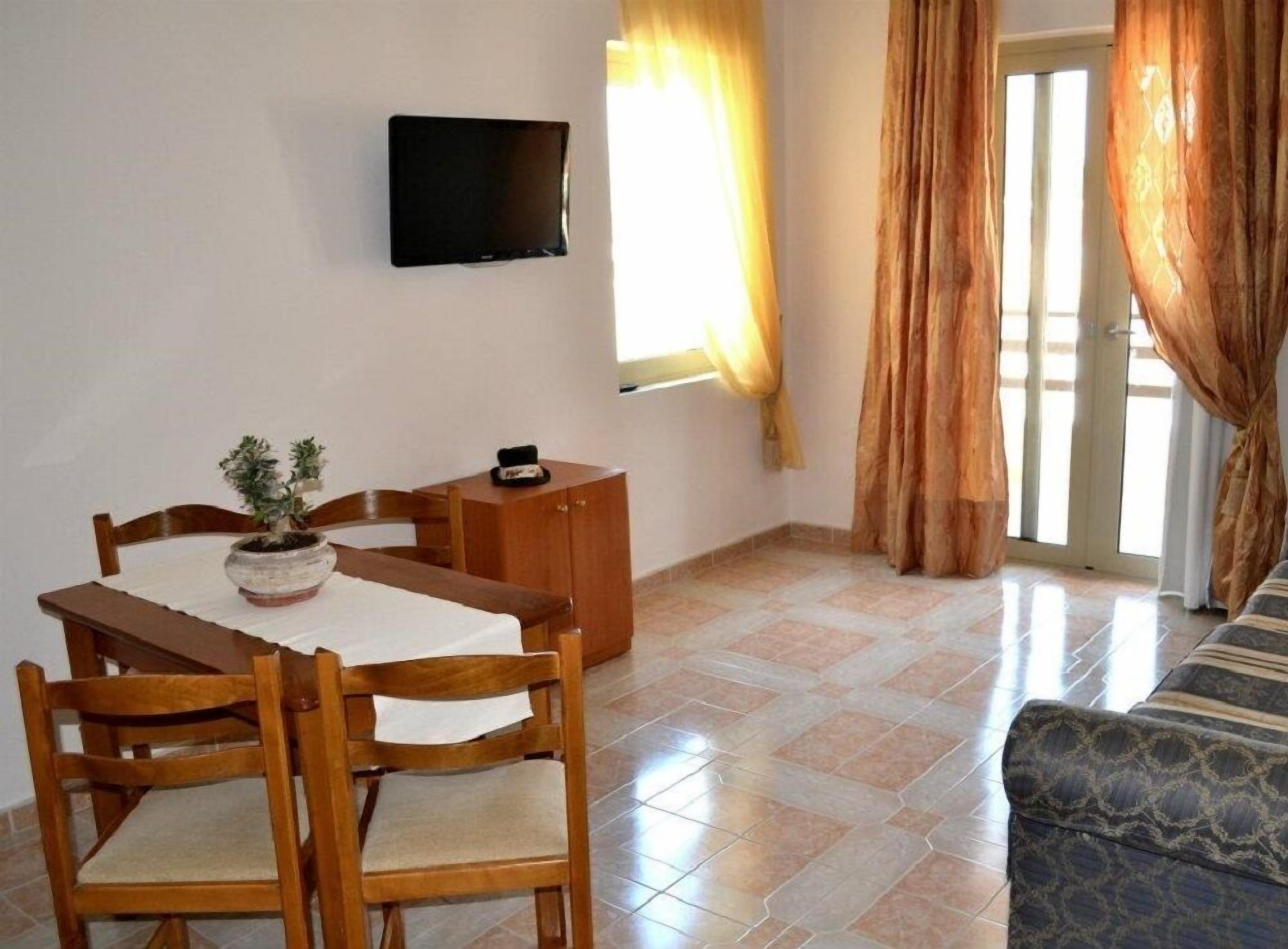 double or twin room, sea view | living area | plasma tv