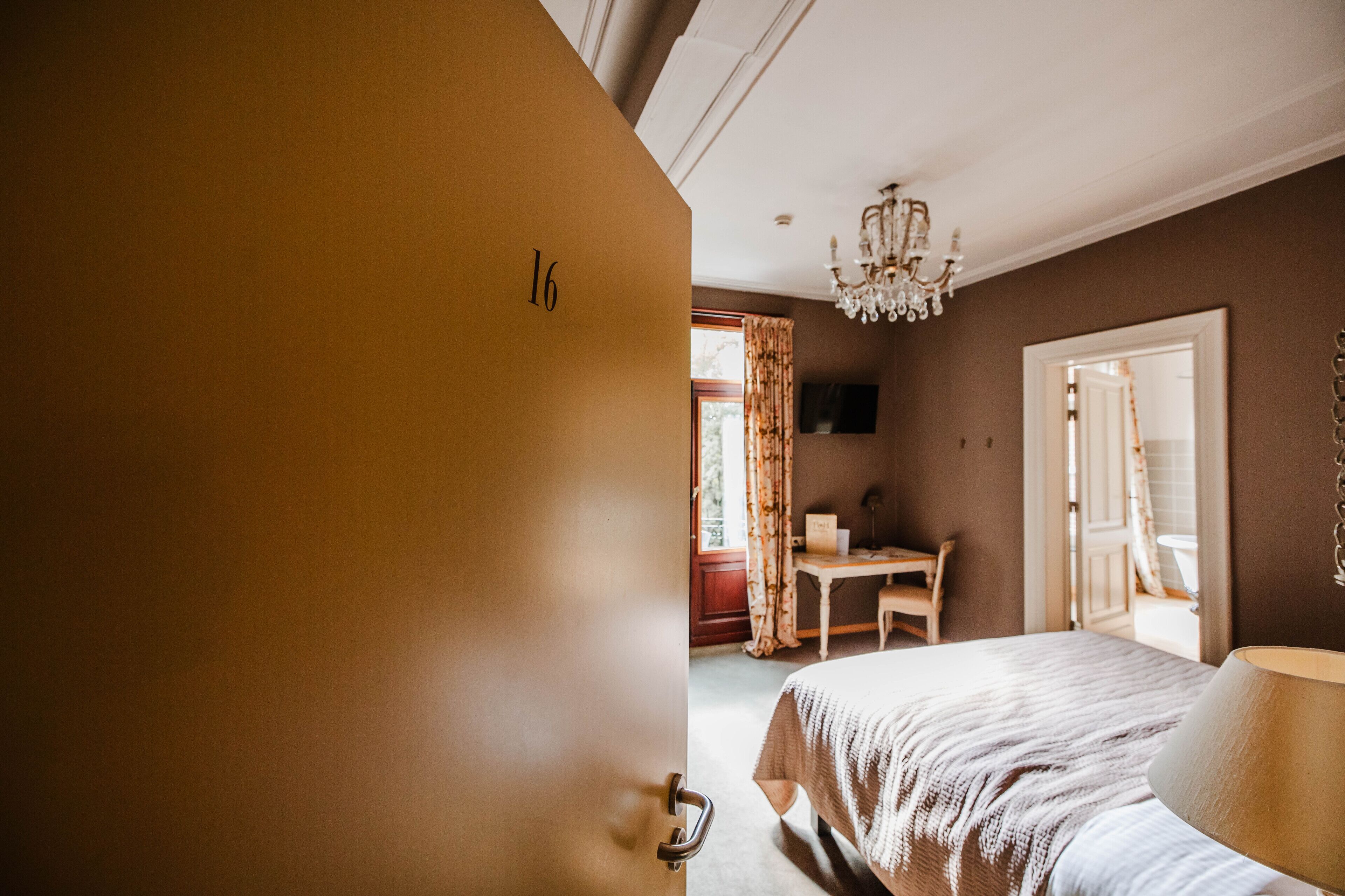 suite, park view, garden area | 1 bedroom, individually decorated, individually furnished, desk