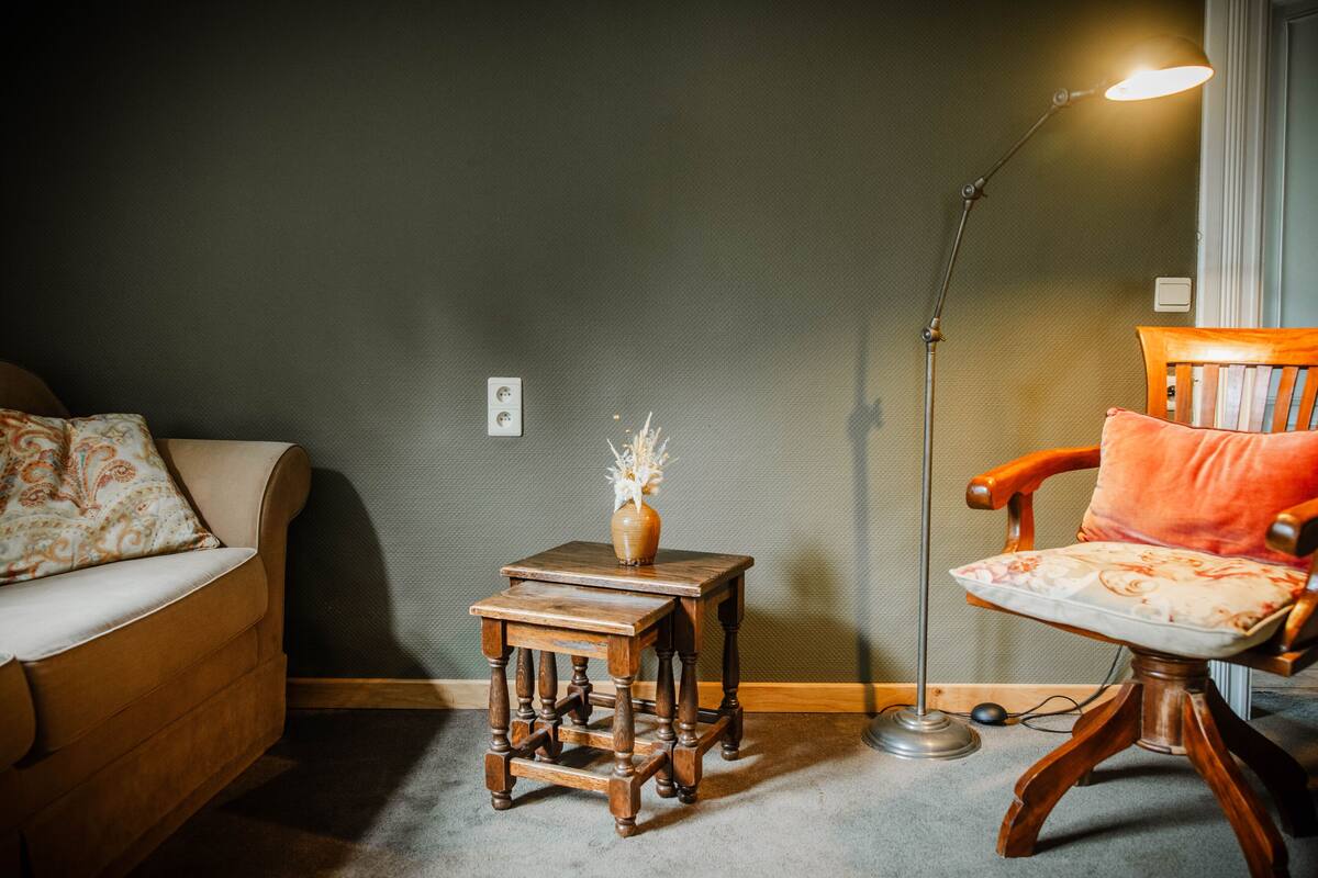 suite, park view, garden area | living area | flat-screen tv