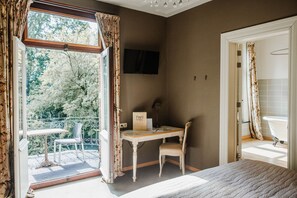 Suite, Park View, Garden Area | Individually decorated, individually furnished, desk, blackout curtains