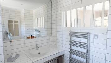 Hair dryer, towels, soap, shampoo