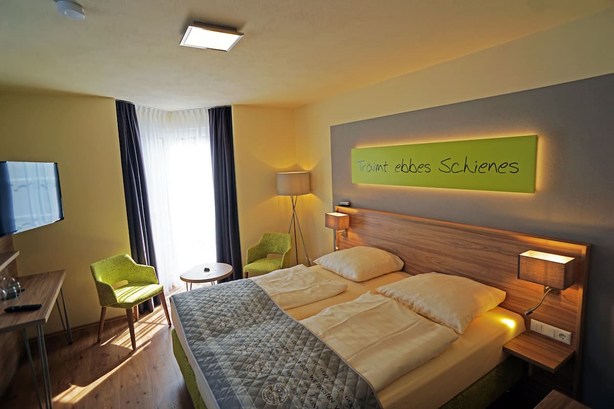 Standard Double Room | In-room safe, desk, laptop workspace, blackout curtains