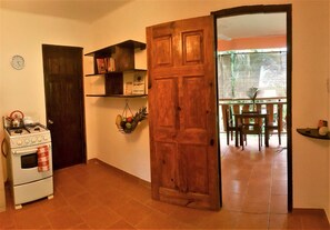 Apartment, Courtyard Area | Private kitchenette | Full-sized fridge, oven, stovetop, coffee/tea maker