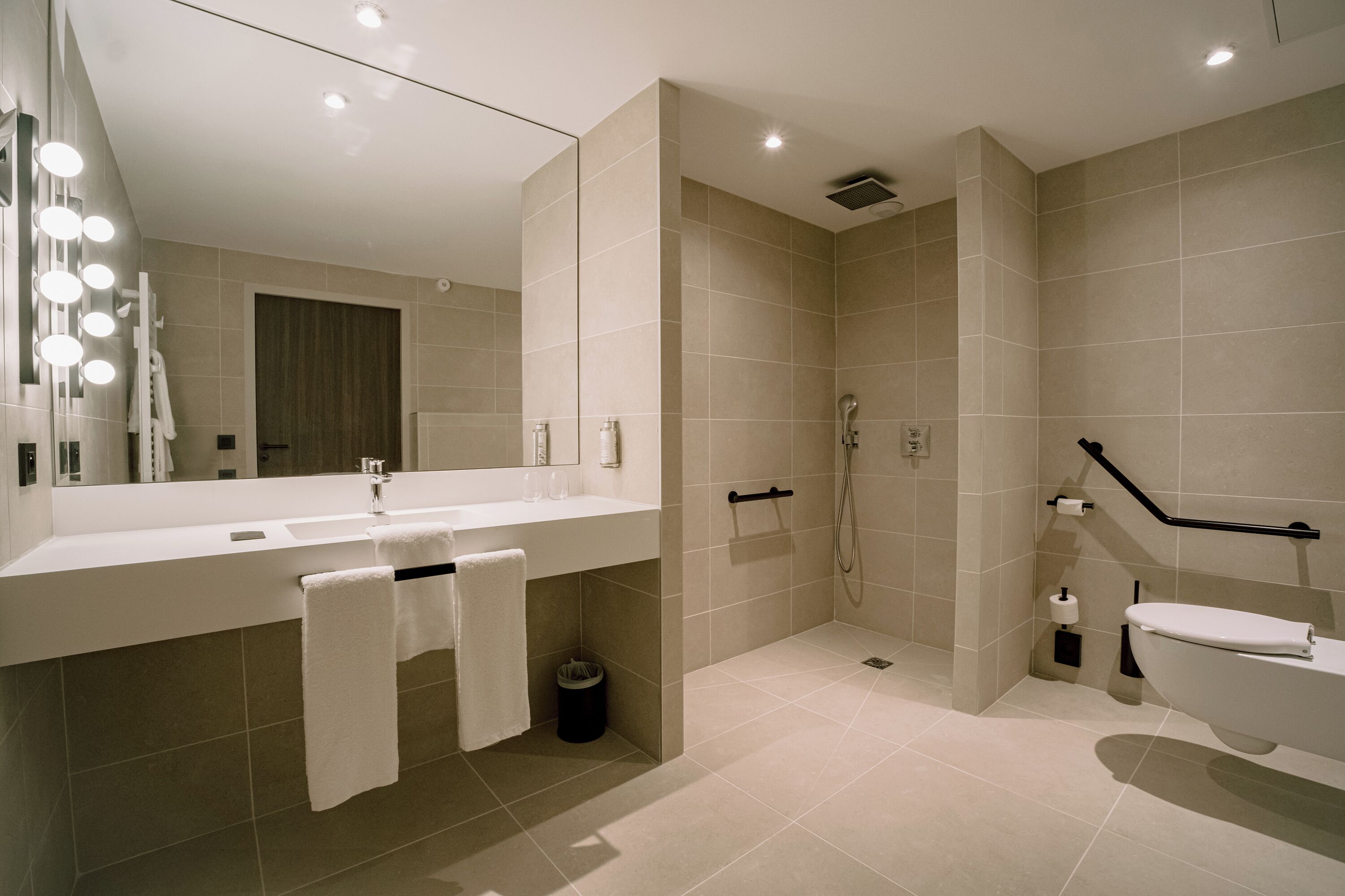 junior suite | bathroom | shower, rainfall showerhead, free toiletries, hair dryer