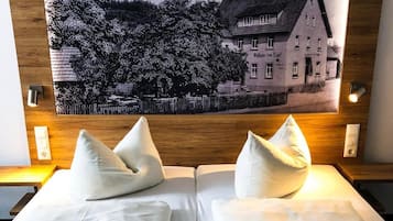 Escritorio, sistema de insonorización, wifi gratis y ropa de cama