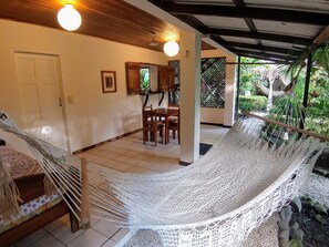Family Apartment, 2 Bedrooms, Kitchen, Garden View | Living room - Colibri Surf House & Flats (Cóbano)