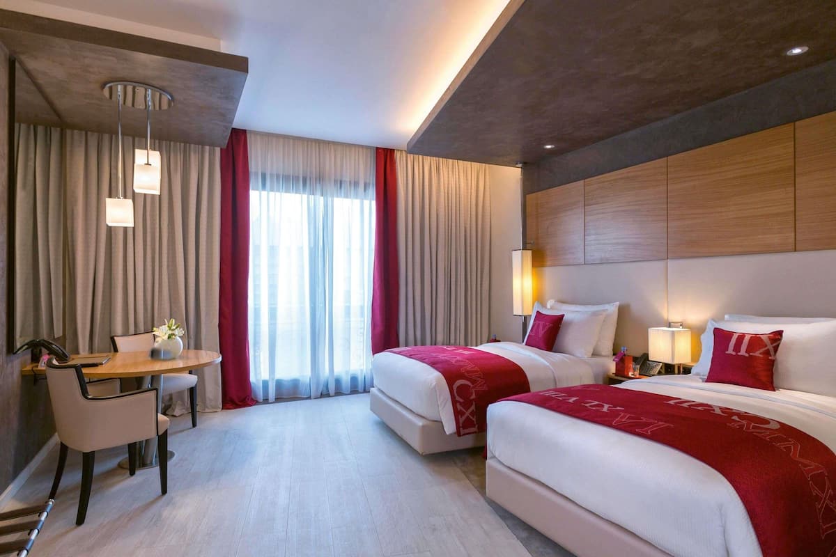Premium bedding, in-room safe, individually decorated