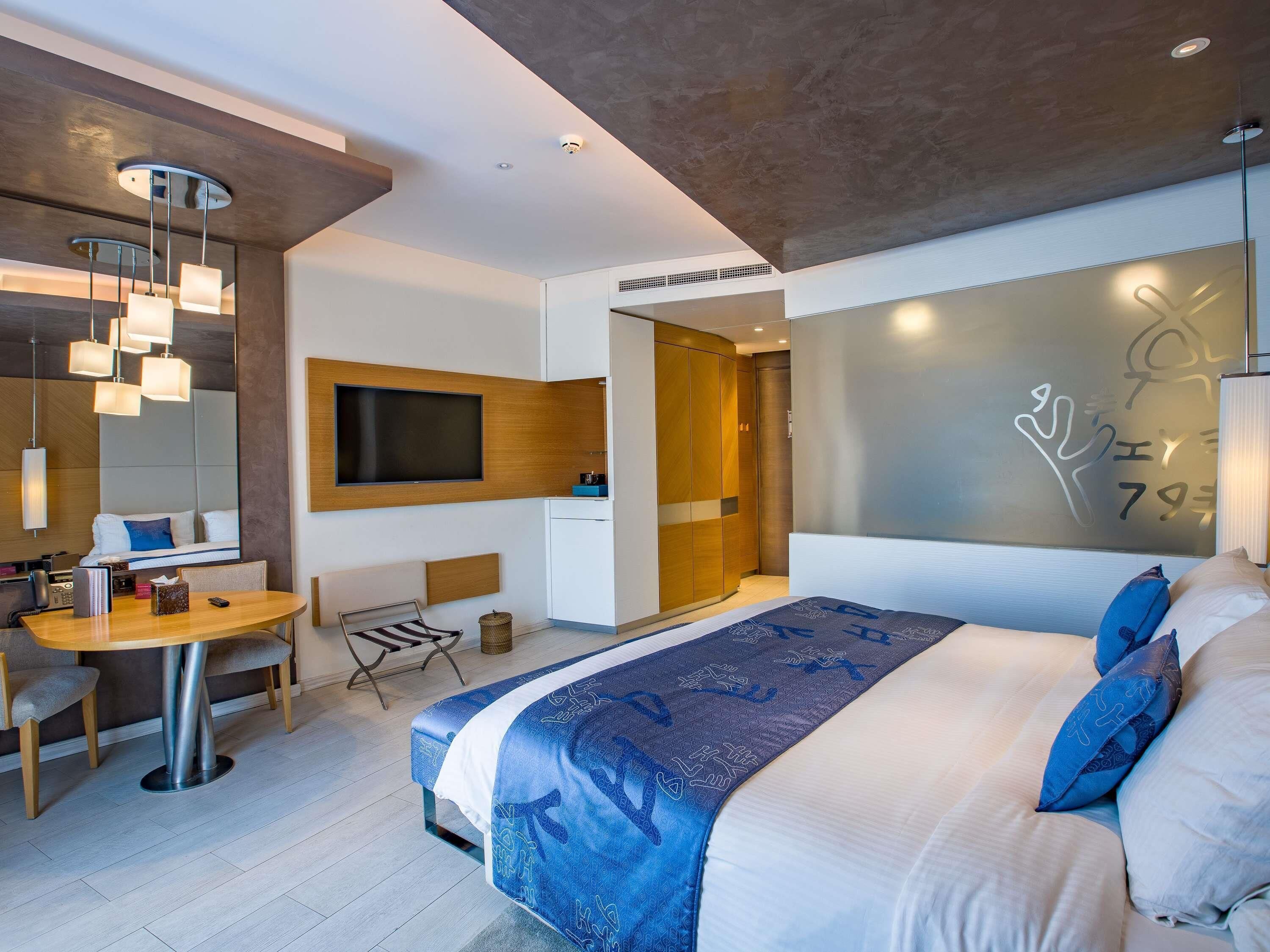 Habitación superior, 1 cama King size | Ropa de cama de alta calidad y caja de seguridad en la habitación 