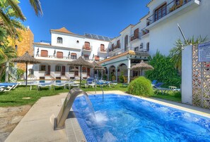 Outdoor pool, pool umbrellas, pool loungers