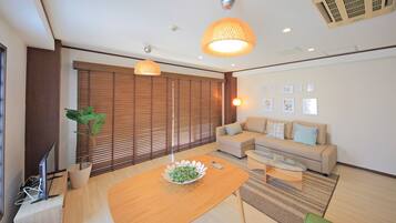 3 Bedroom Apartment | Living area | 43-inch flat-screen TV with digital channels, TV