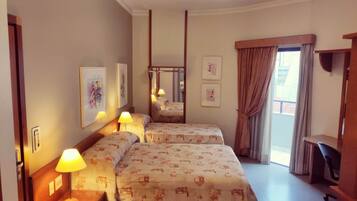 Comfort Triple Room | Minibar, desk, blackout drapes, free WiFi
