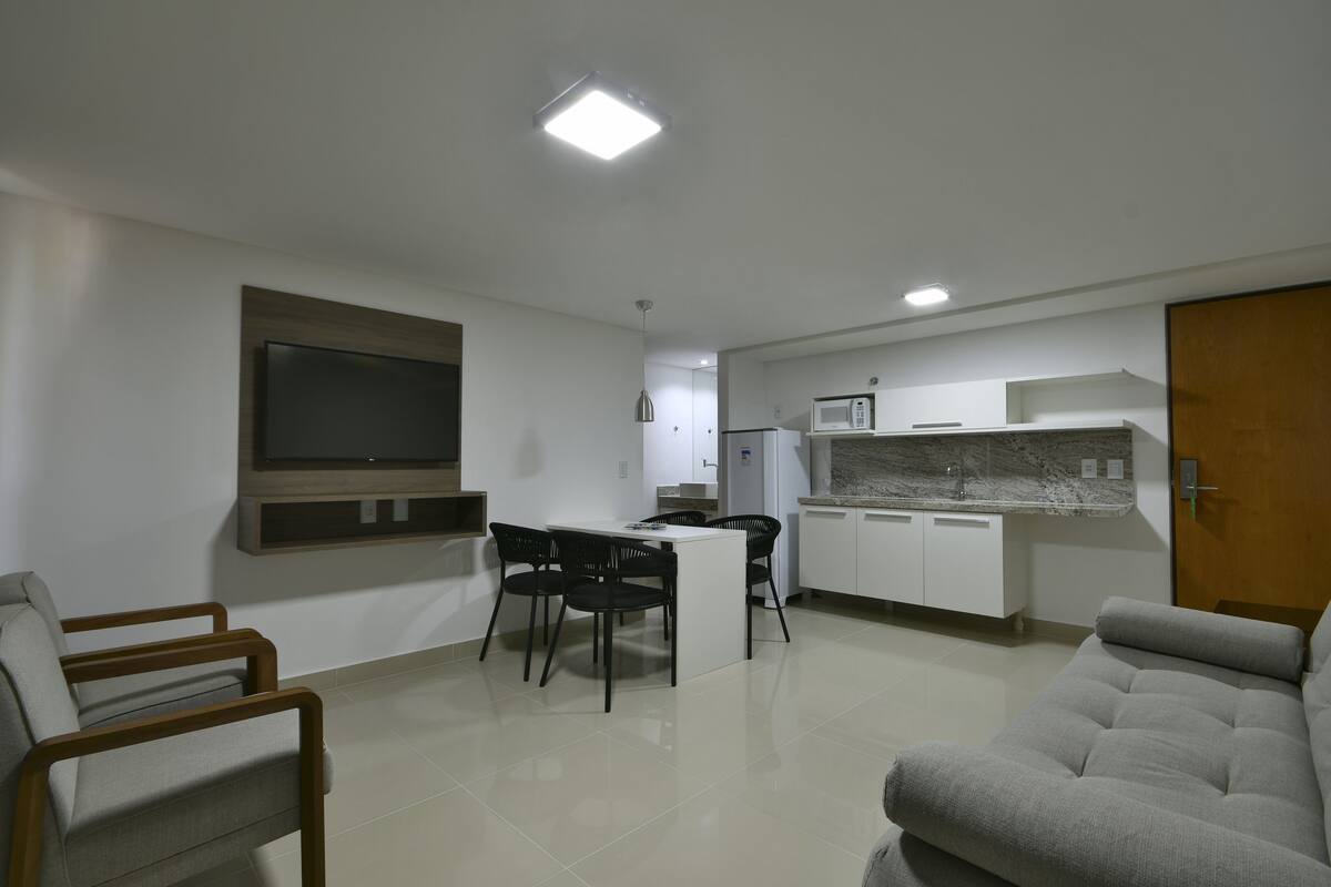 suite (gold) | living area | 32-inch flat-screen tv with cable channels, tv