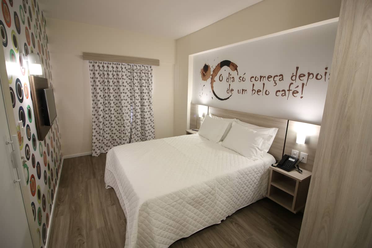 Standard Room, Multiple Beds | Minibar, free WiFi, bed sheets