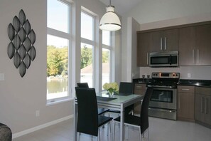 Townhome, 1 King Bed, Patio, Lakeside | In-room dining - Landings Condos (Saugatuck)