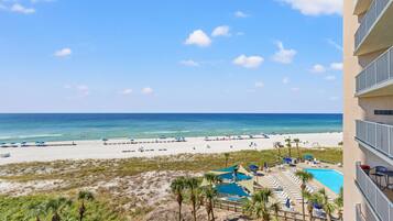 On the beach, sun-loungers
