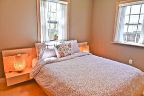 1 bedroom, desk, iron/ironing board, travel cot