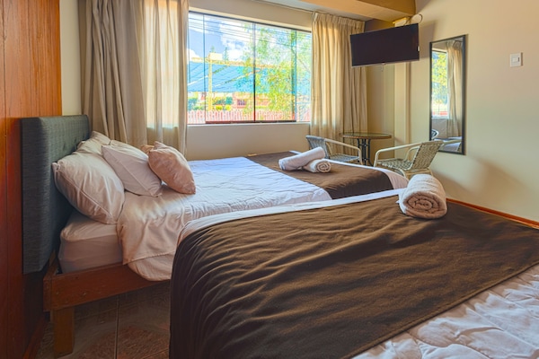 Literie hypoallergénique, couette en duvet d'oie, rideaux occultants