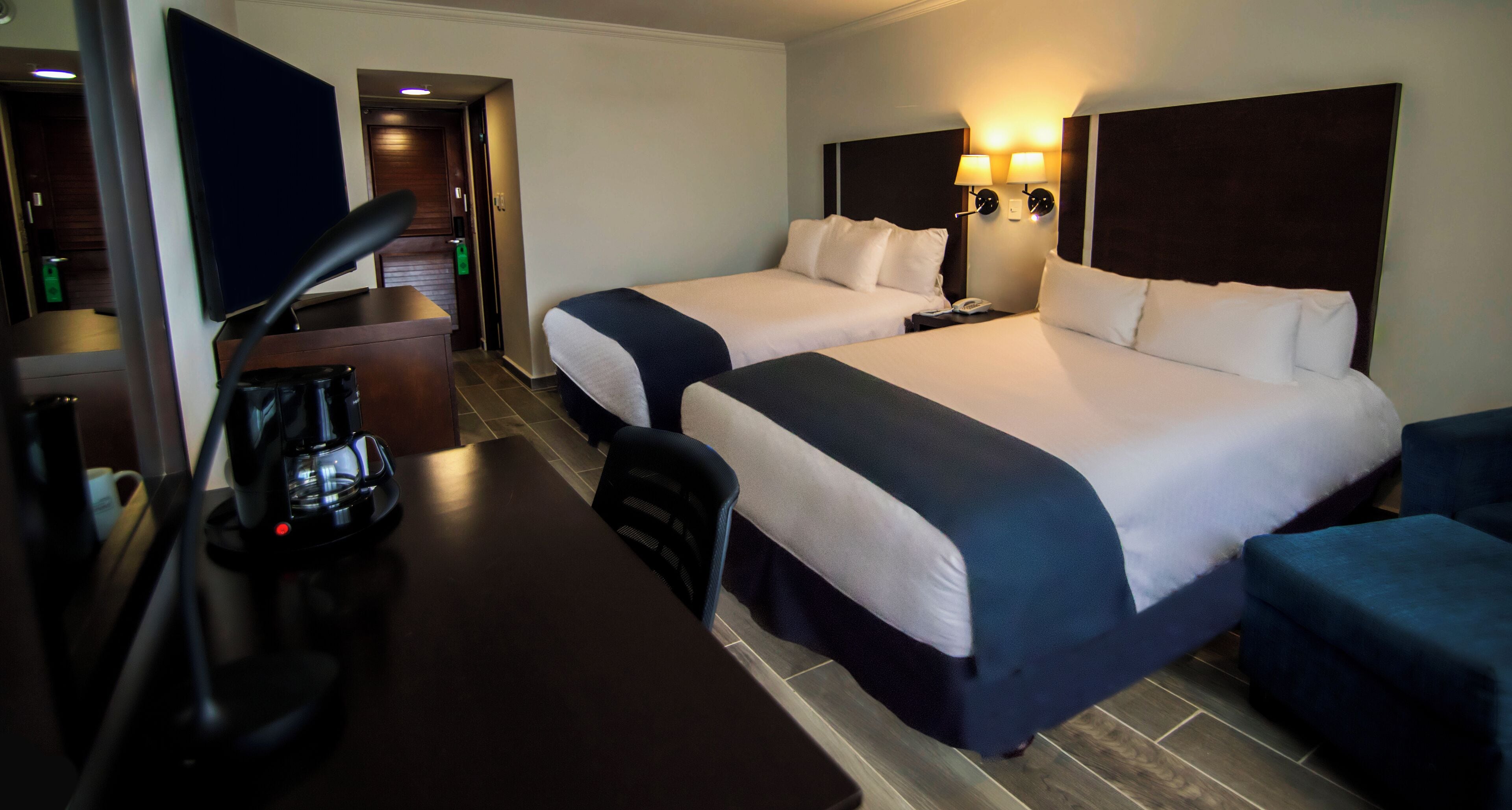 superior room, 2 double beds, non smoking | in-room safe, desk, iron/ironing board, free rollaway beds