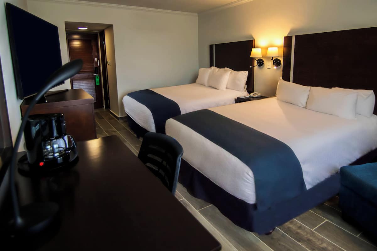 superior room, 2 double beds, non smoking | in-room safe, desk, iron/ironing board, free rollaway beds