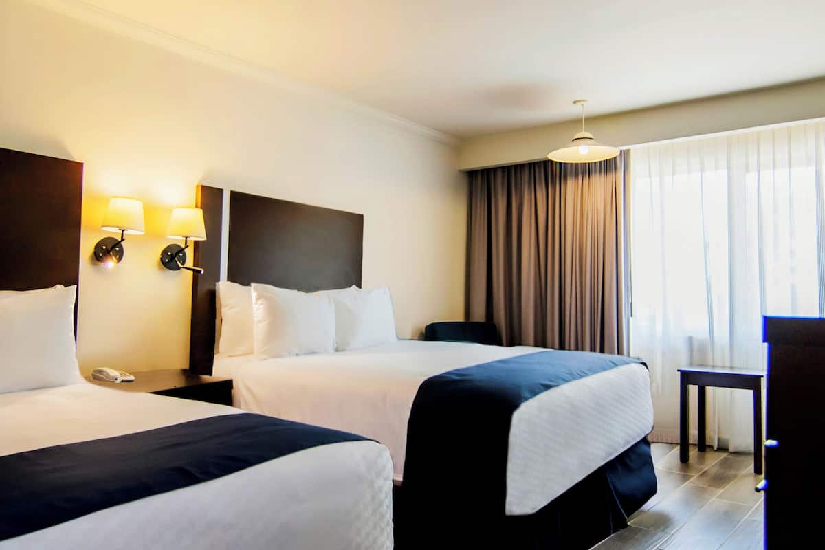 superior room, 2 double beds, non smoking | in-room safe, desk, iron/ironing board, free rollaway beds