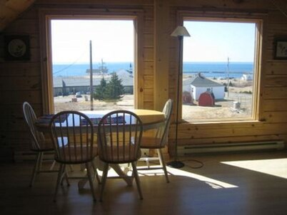 New Log Home with Gorgeous Ocean View in Historic Acadian Village