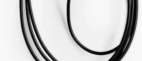 A white device with a black cable.