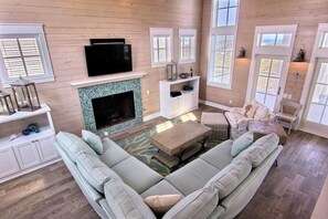 Smart TV, fireplace, DVD player, books