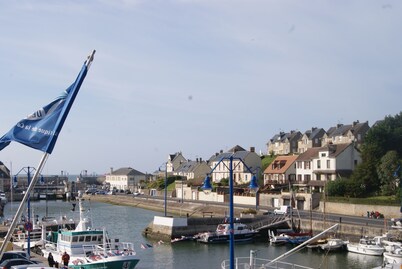 Comfortable house overlooking the port and close to shops.