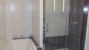 Combined shower/tub, hair dryer, towels, soap