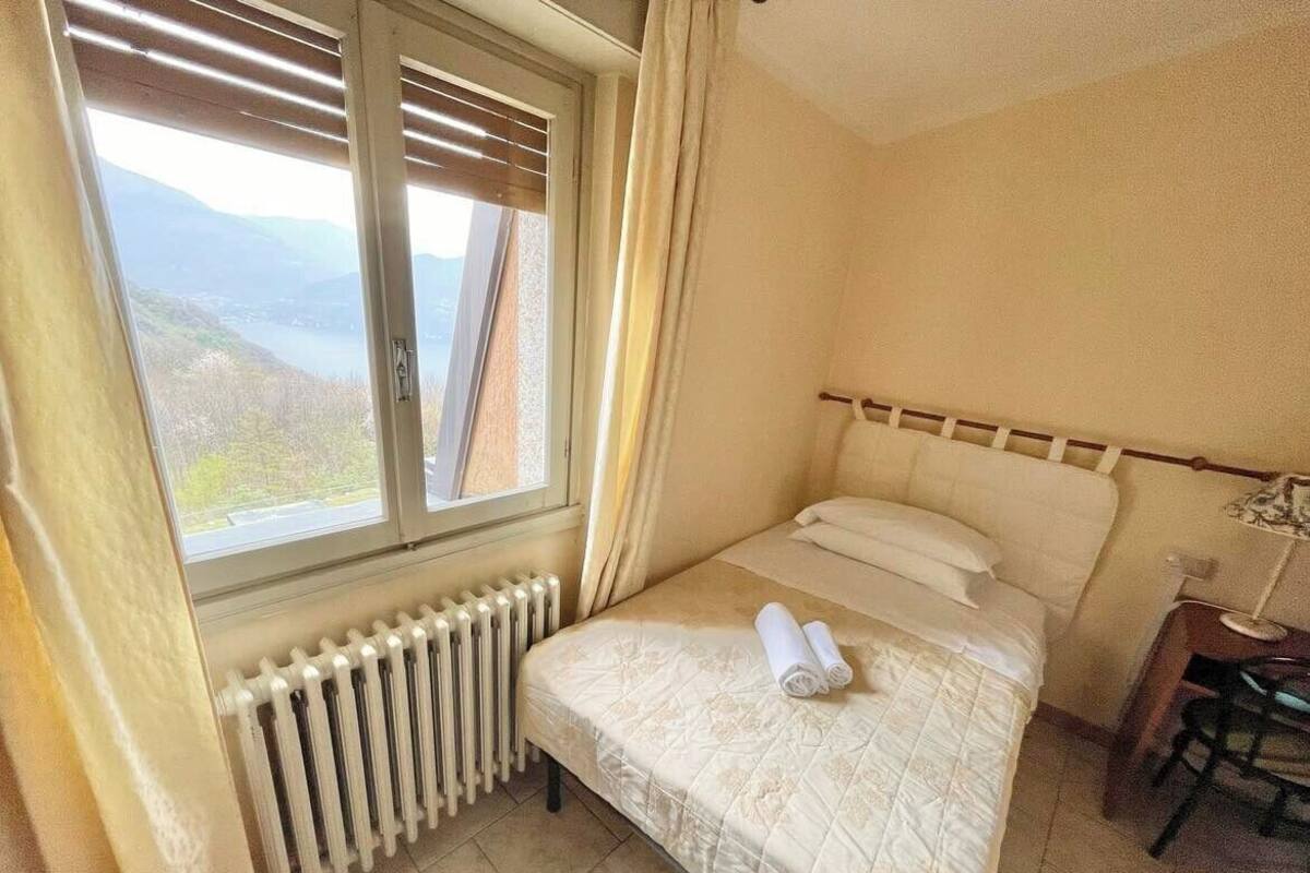 Kamar Single Standar, pemandangan danau | Minibar, meja kerja, Wi-Fi gratis, dan seprai linen