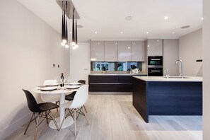 Apartment, 2 Bedrooms, Non Smoking | Private kitchen | Full-sized fridge, oven, stovetop, dishwasher
