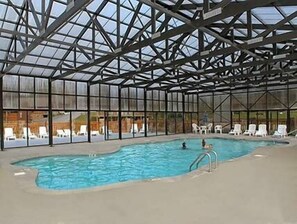 Indoor pool, a heated pool - SPACIOUS NEW CABIN -2 King Suites -Hot Tub - WiFi - MOUNTAIN VIEWS -POOL- RESORT (Pigeon Forge)