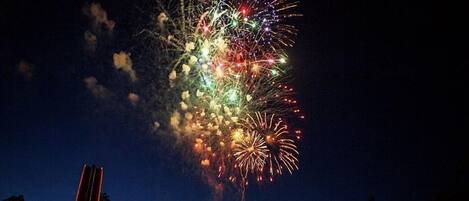 A night sky with fireworks.