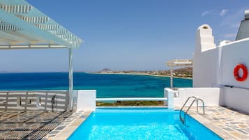 Seasonal outdoor pool, pool umbrellas, sun loungers