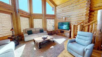 TV connectée, cheminée, lecteur de DVD, baby-foot