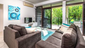 Deluxe Apartment, 3 Bedrooms, 2 Bathrooms, Garden View | Living area | Flat-screen TV, Netflix