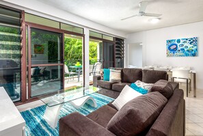 Deluxe Apartment, 3 Bedrooms, 2 Bathrooms, Garden View | Living area | Flat-screen TV, Netflix