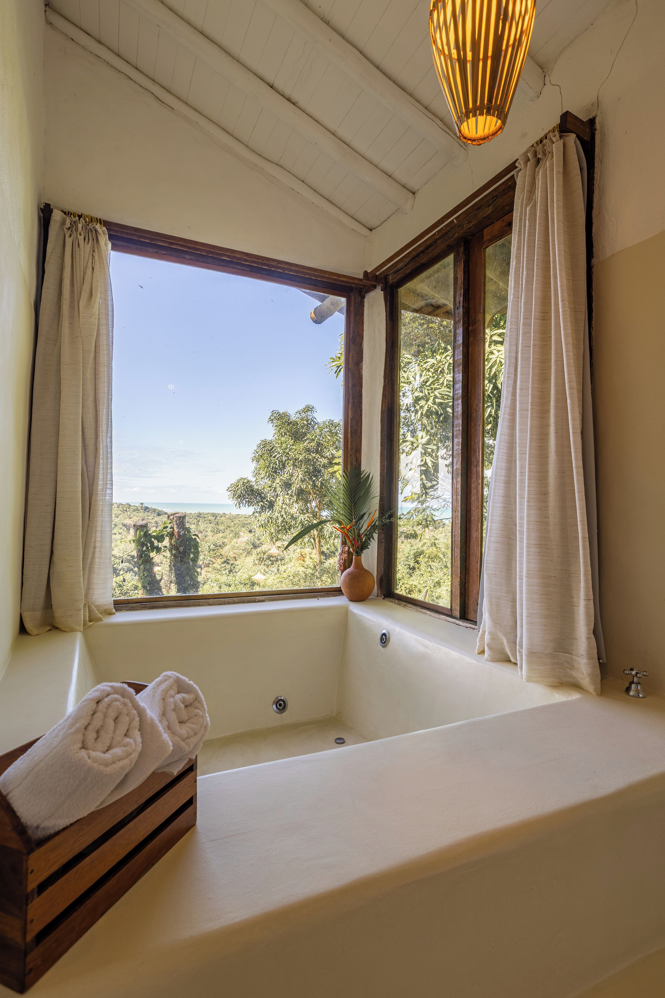 deluxe duplex, bathtub, poolside | bathroom amenities | shower, free toiletries, hair dryer, bathrobes